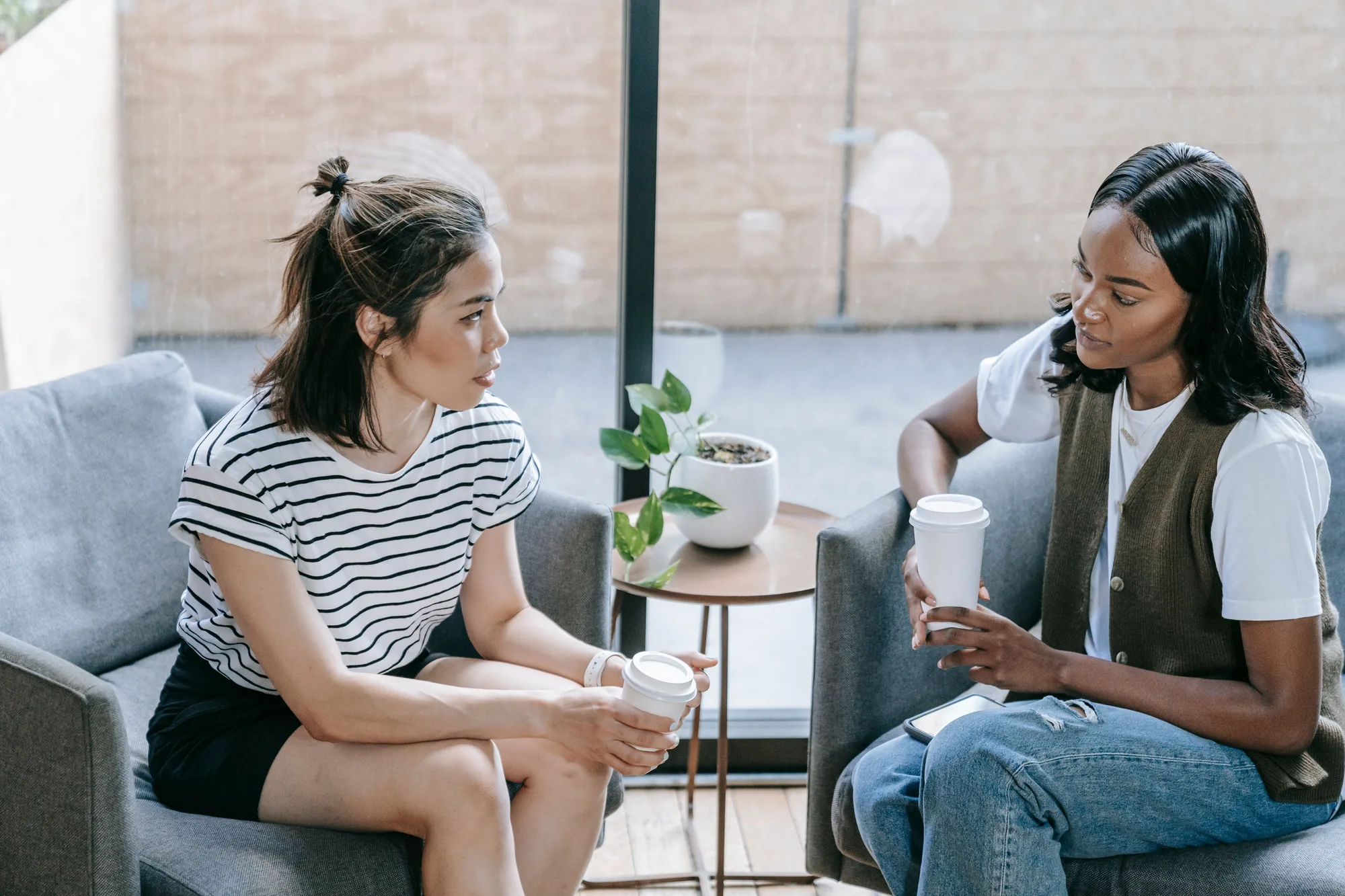 Two women sharing a thoughtful conversation